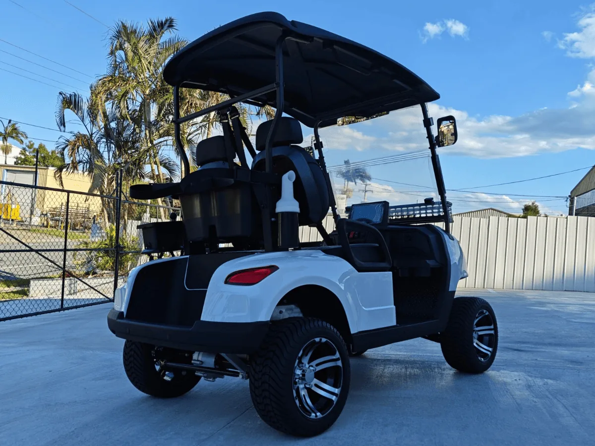 White JSH0701 two-seat golf cart in Australia, rear quarter view