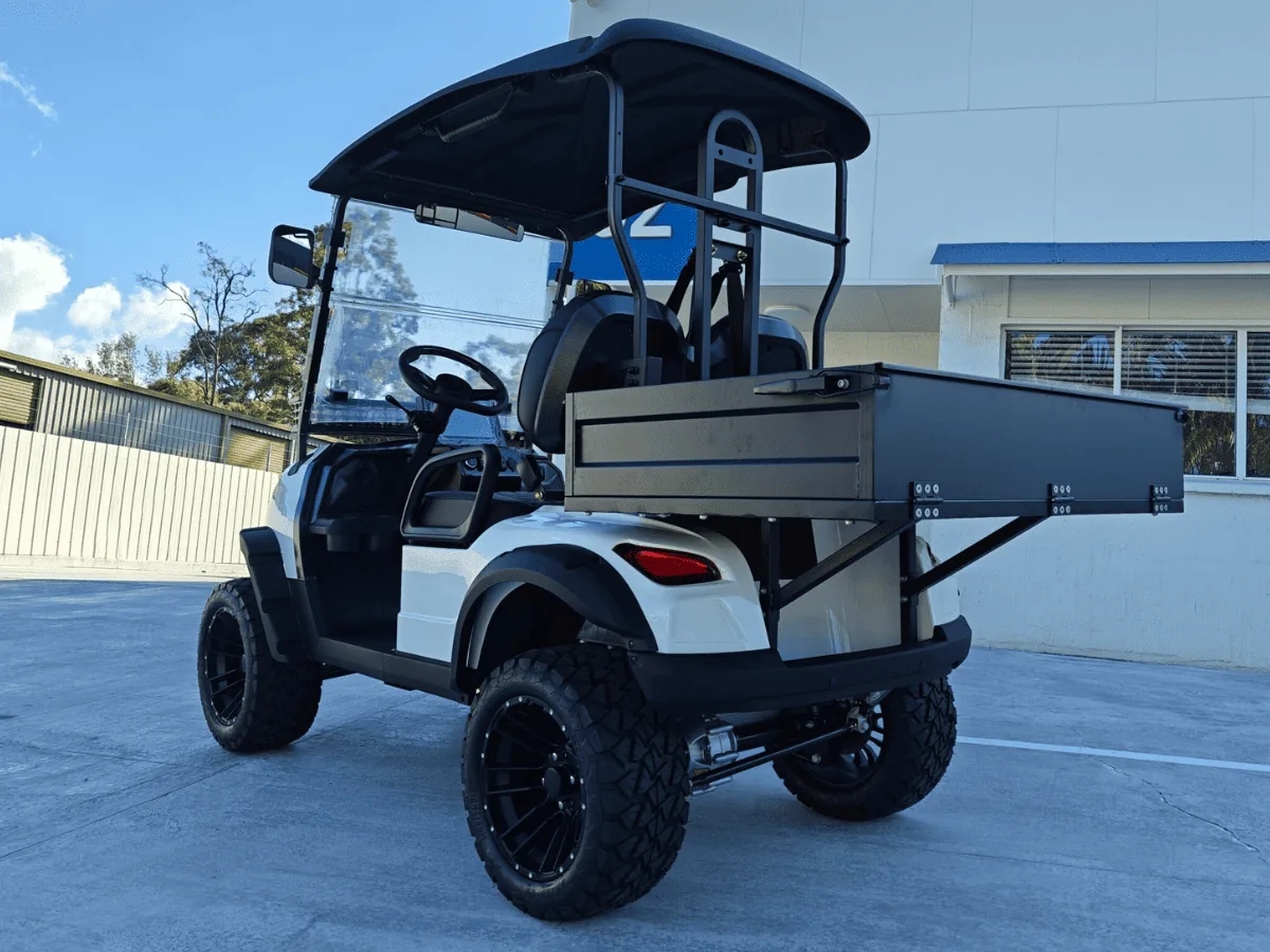 White JSH0707 utility golf cart in Australia showing the short tray bed