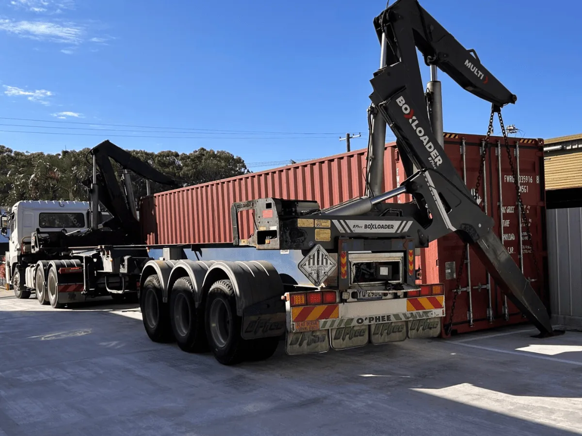 Shipping container being unloaded for JSH Australia stock