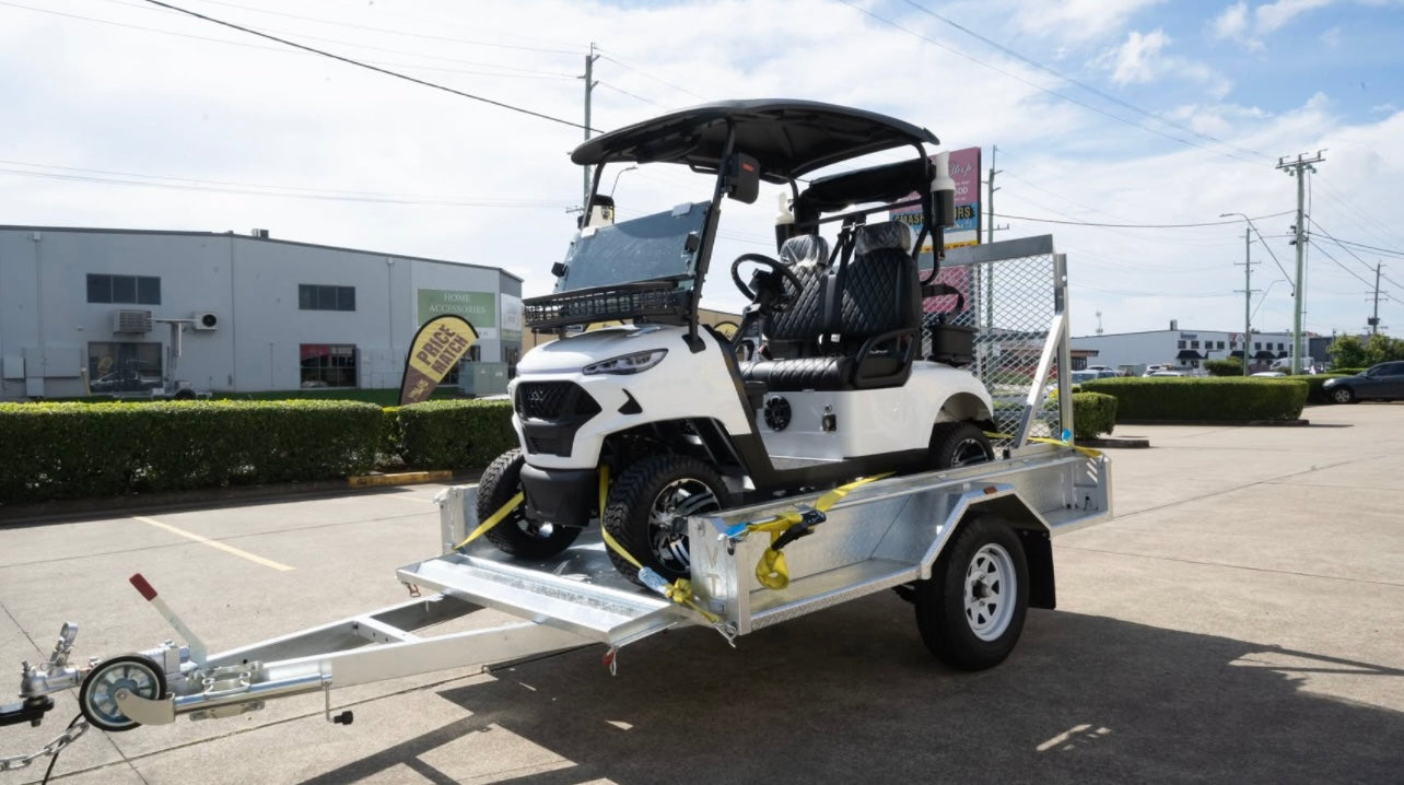 JSH two-seat golf buggy loaded on a braked trailer package