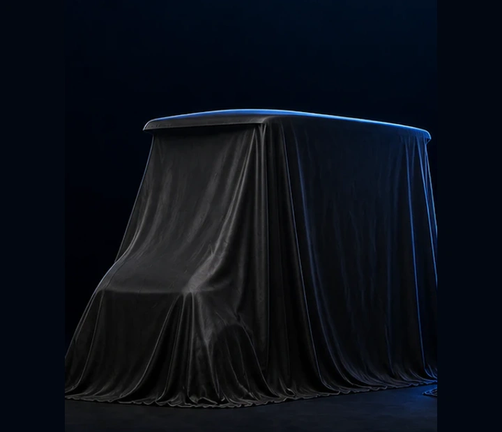 Fully covered future Sport Edition vehicle in a dark studio
