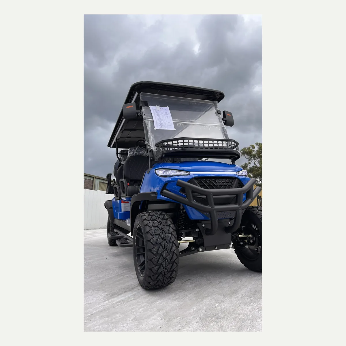 Blue JSH0704 lifted 4+2 shuttle buggy from the front quarter