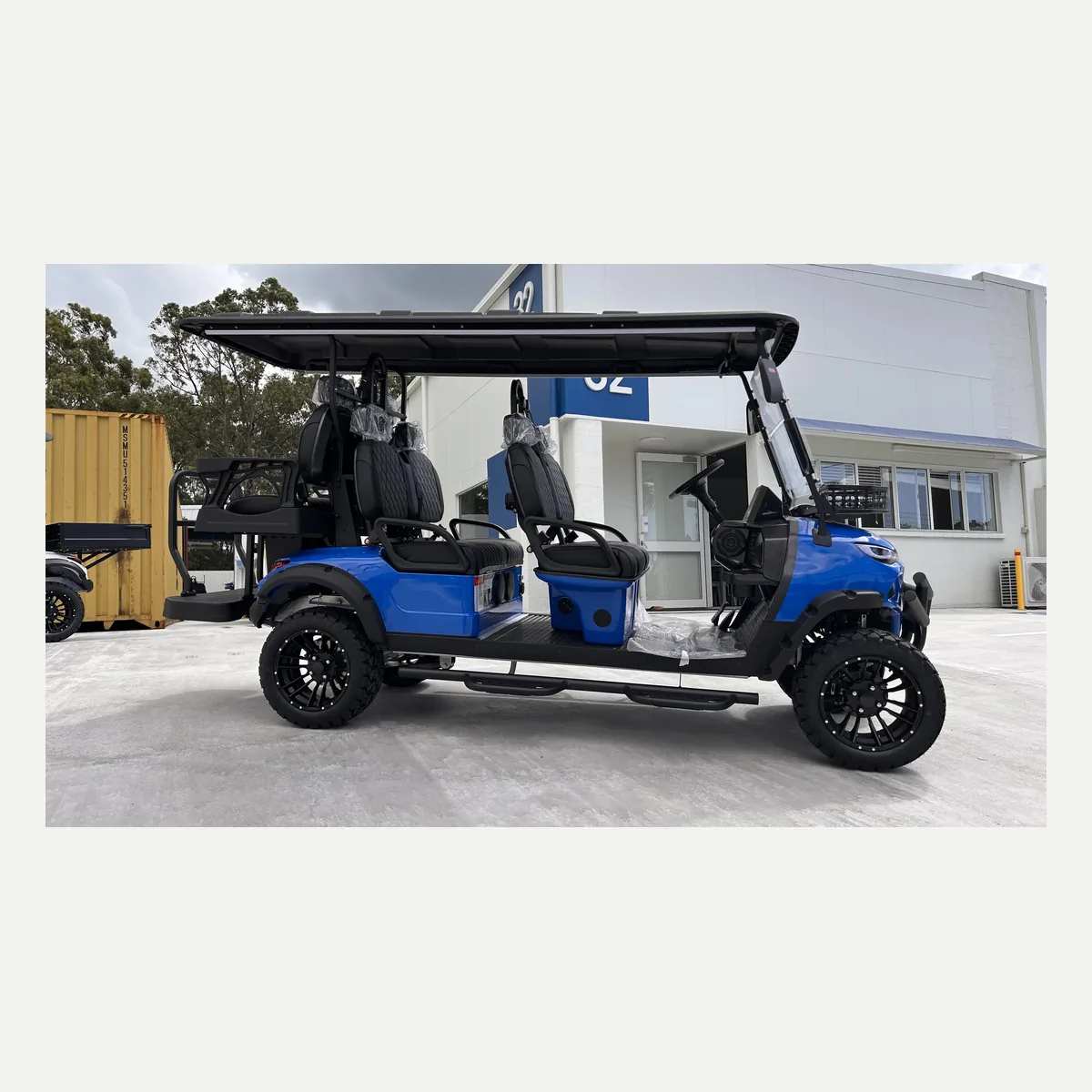 Blue JSH0704 lifted 4+2 shuttle buggy in side profile