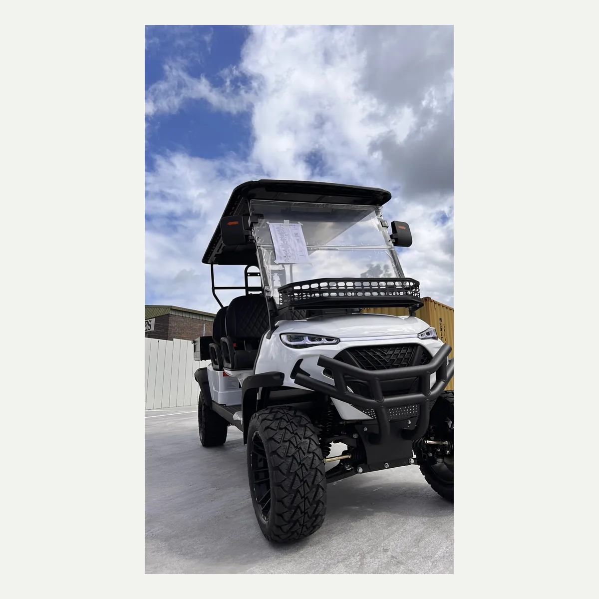 White JSH0709 four-seat utility buggy from the front quarter