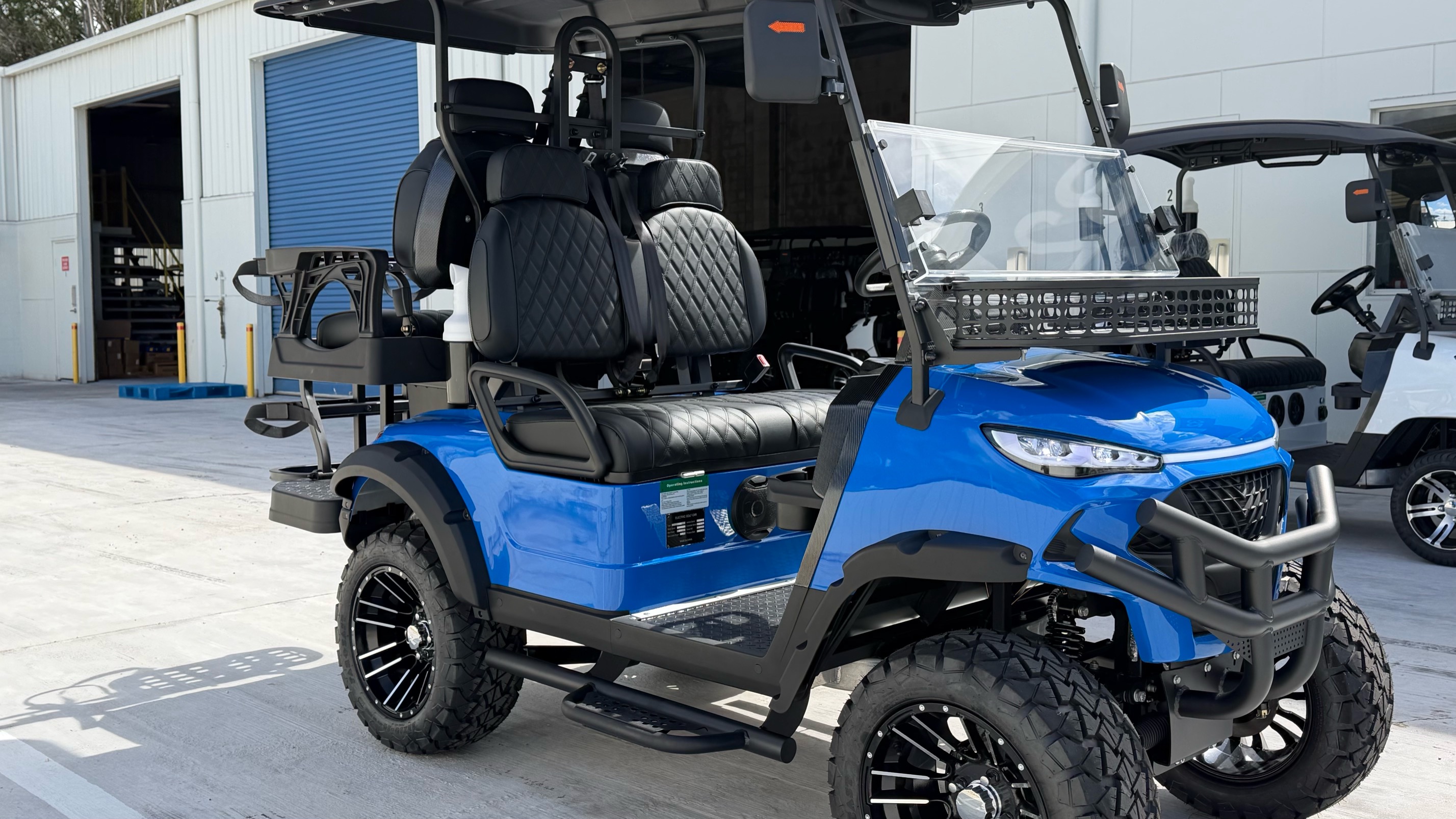 Blue JSH0702 lifted two plus two seat buggy