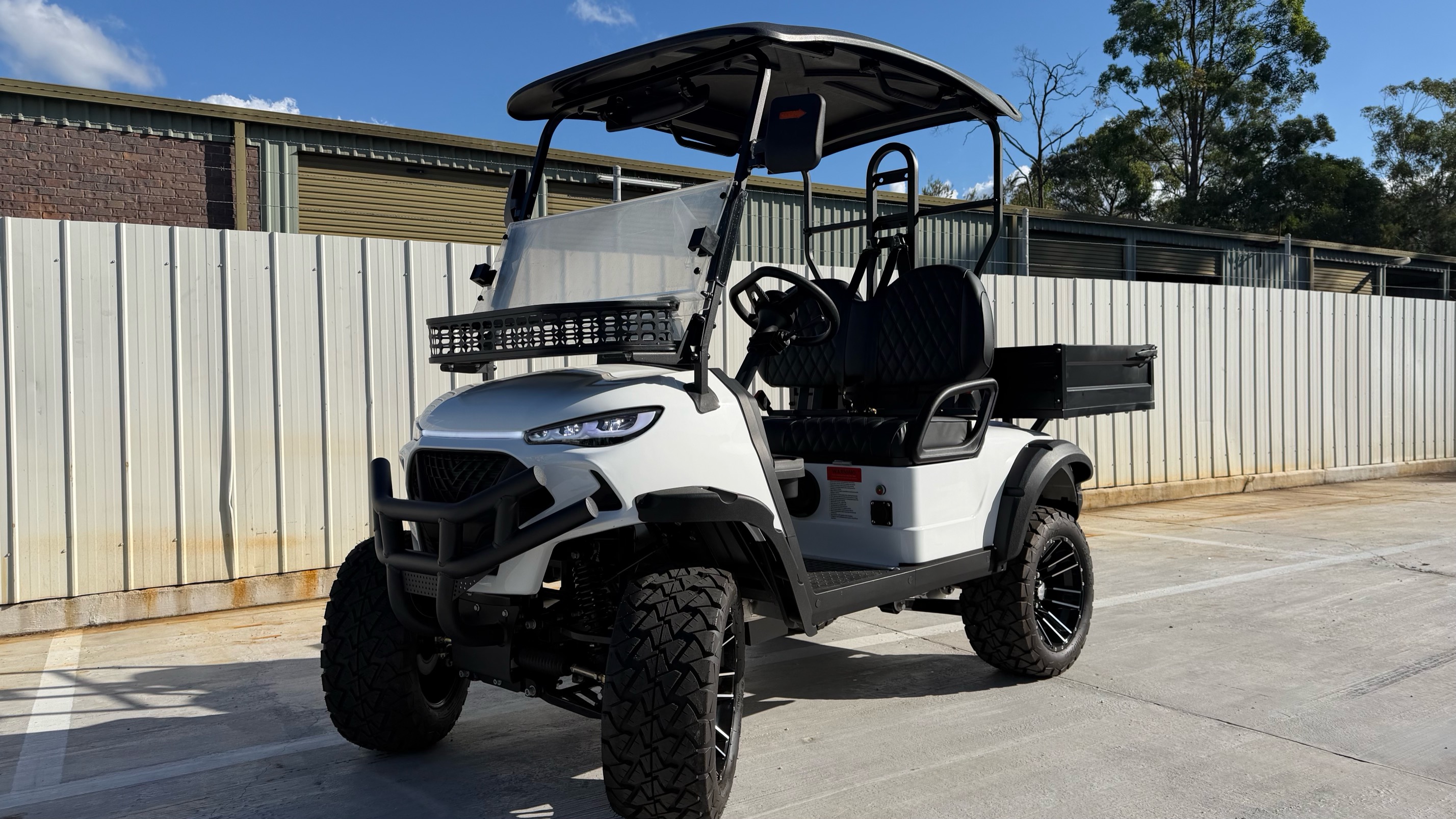 White JSH0707 lifted two-seat utility buggy with rear cargo box