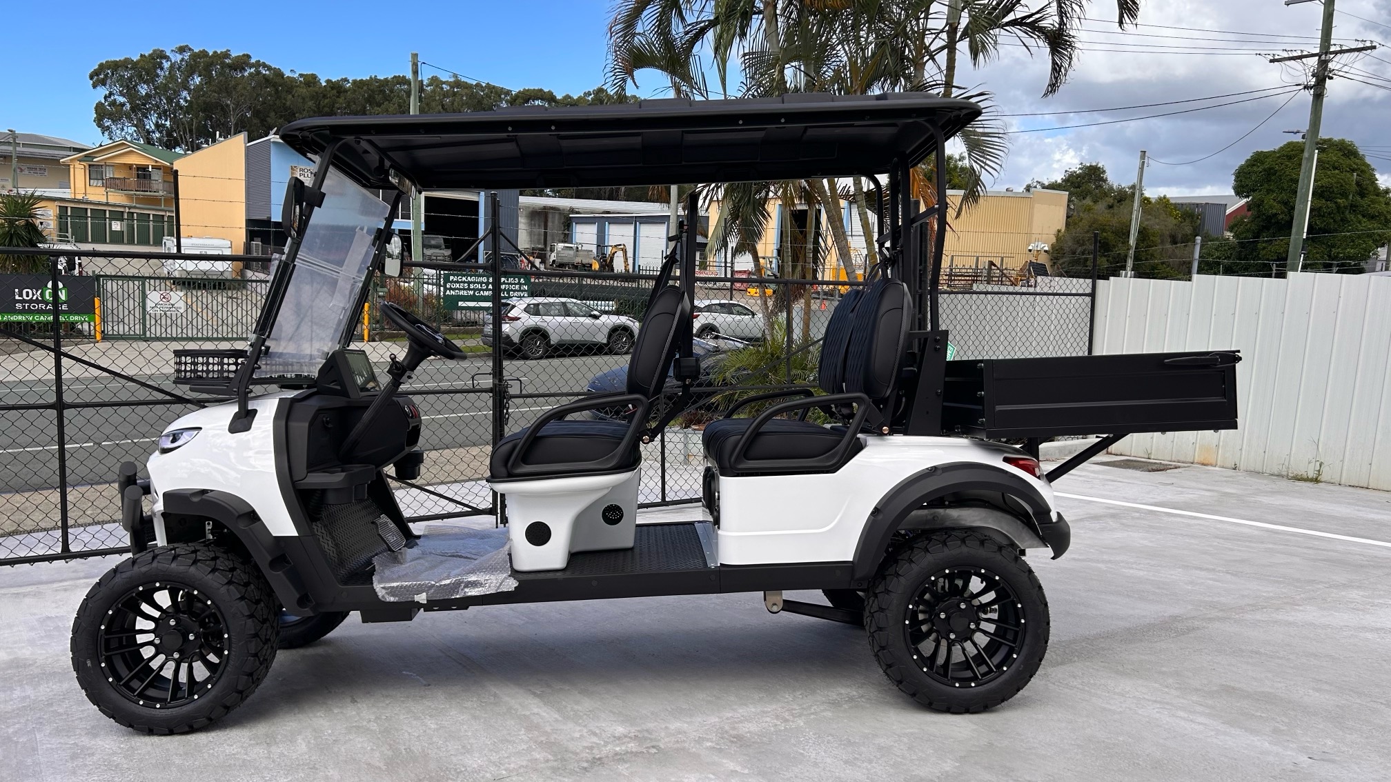 White JSH0709 lifted four-seat utility buggy with rear cargo box
